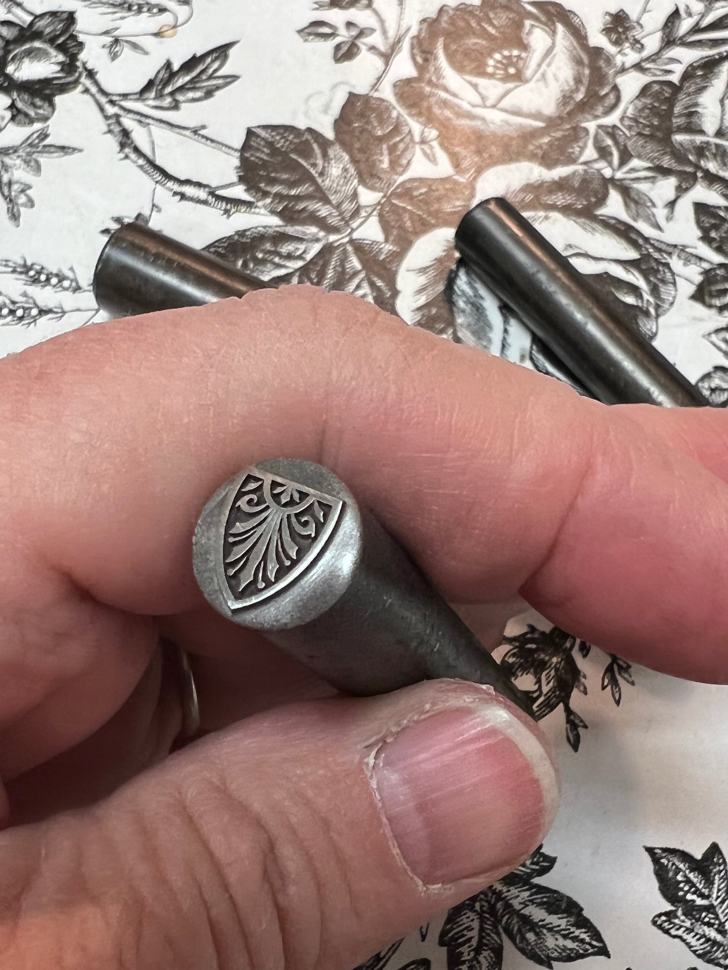 Scroll work shield (The Mitre)