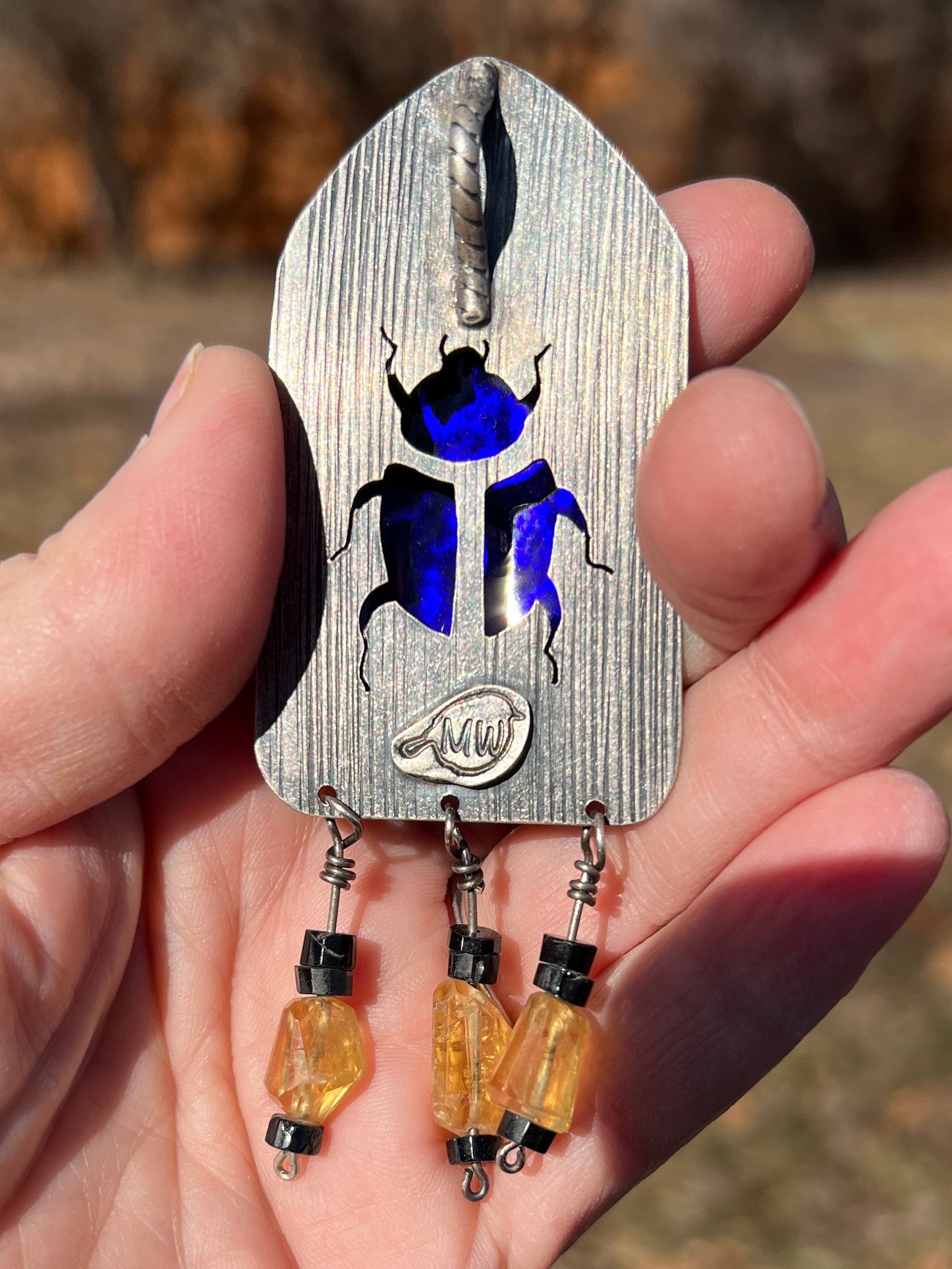 Isis enamel pendant